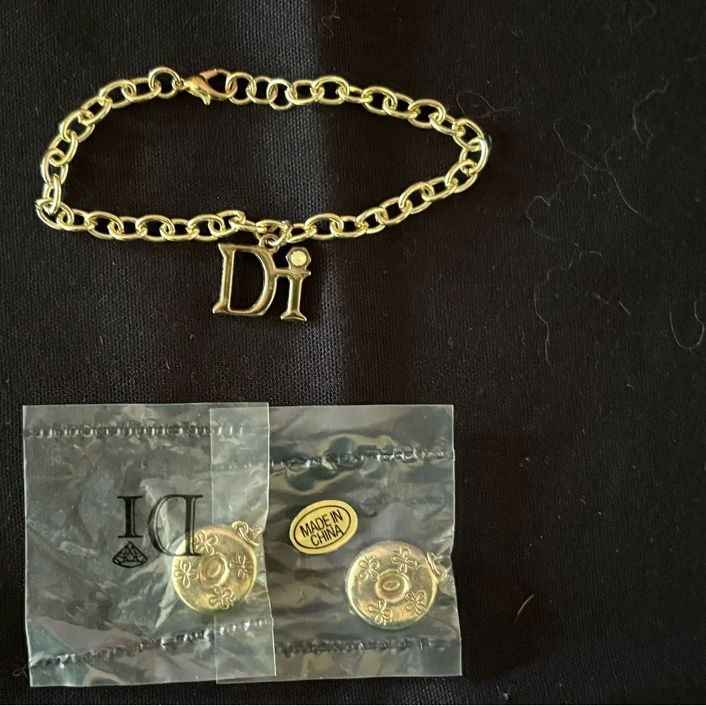 Diamond International Gold Charm Bracelet Set. 8 bracelets multiple charms. - Picture 10 of 15
